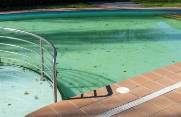 how to clean the bottom of the pool remove sand and algae
