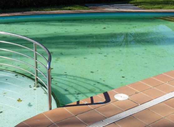 how to clean the bottom of the pool remove sand and algae