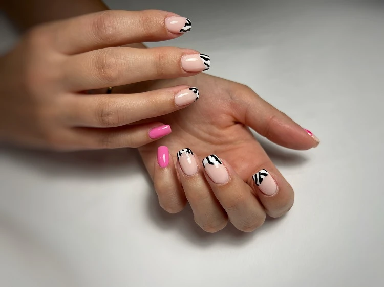 abstract french tip nails with black and pink