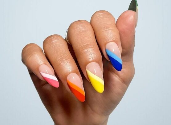abstract mismatched angle french tips acrylic nails almond shape summer design ideas 2023