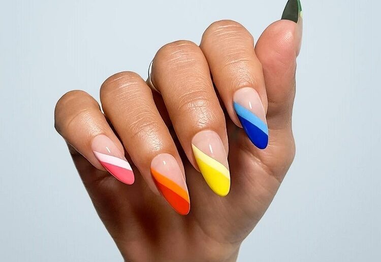 abstract mismatched angle french tips acrylic nails almond shape summer design ideas 2023