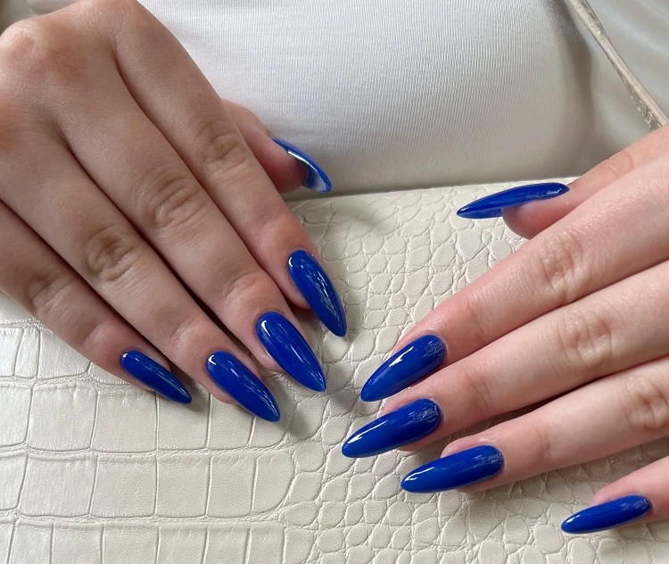 cobalt blue nails long stiletto manicure