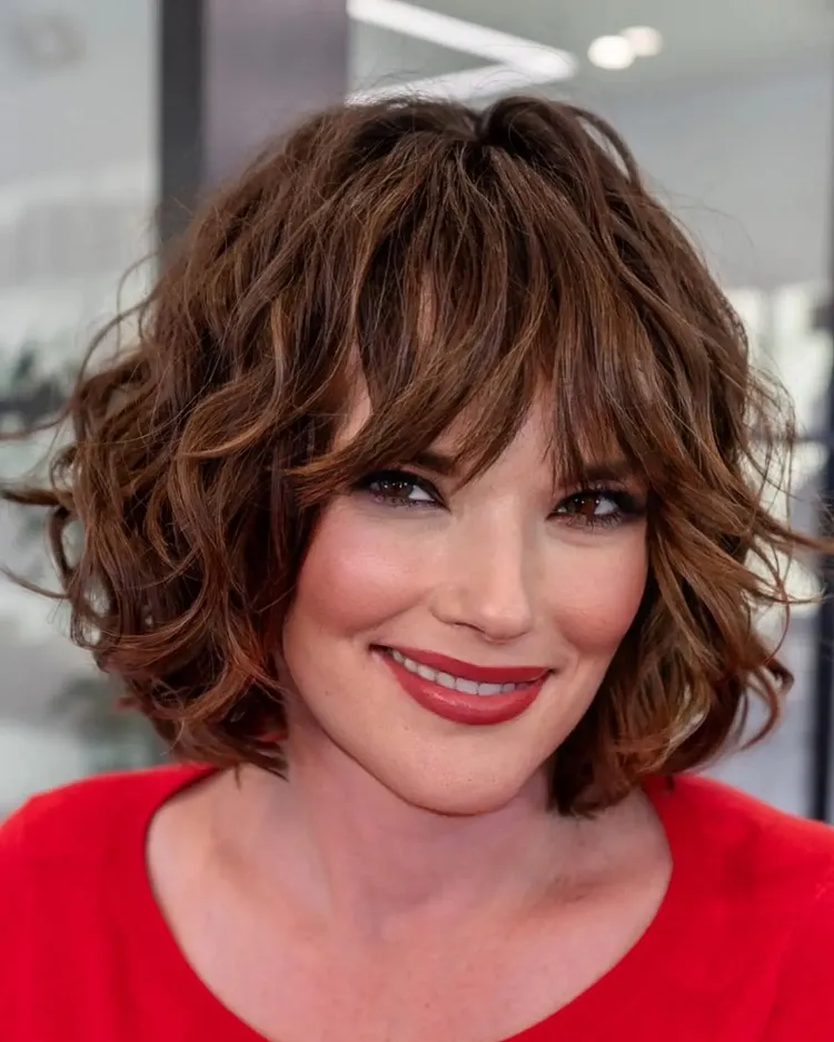 curly bob women over 50 shaggy bangs hairstyle inspo summer 2023