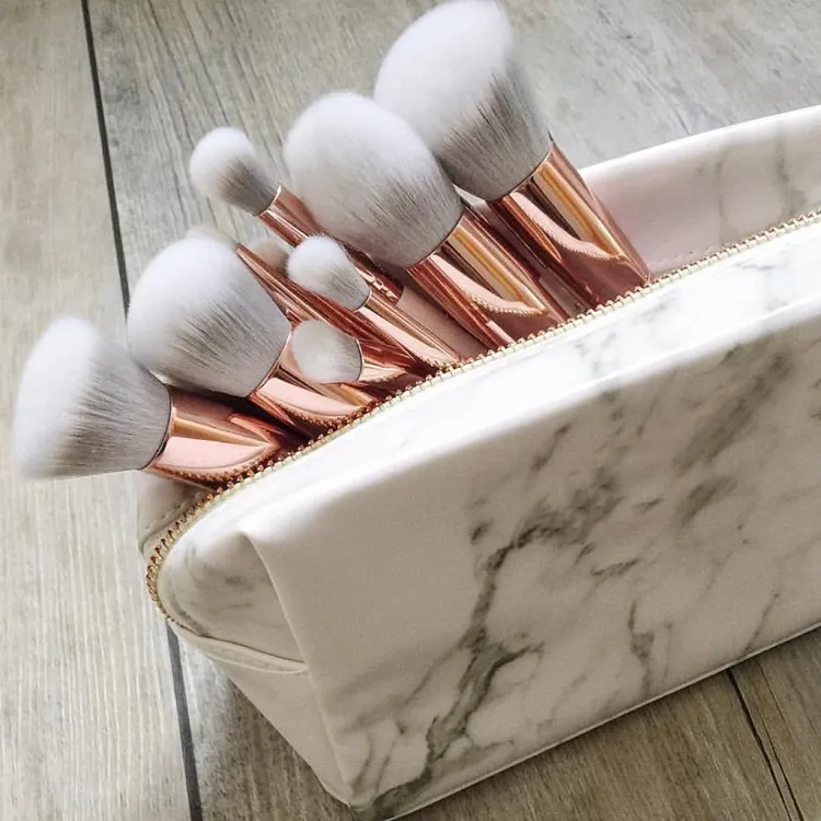 how to pack makeup for travel gather the brushes in a secure bag