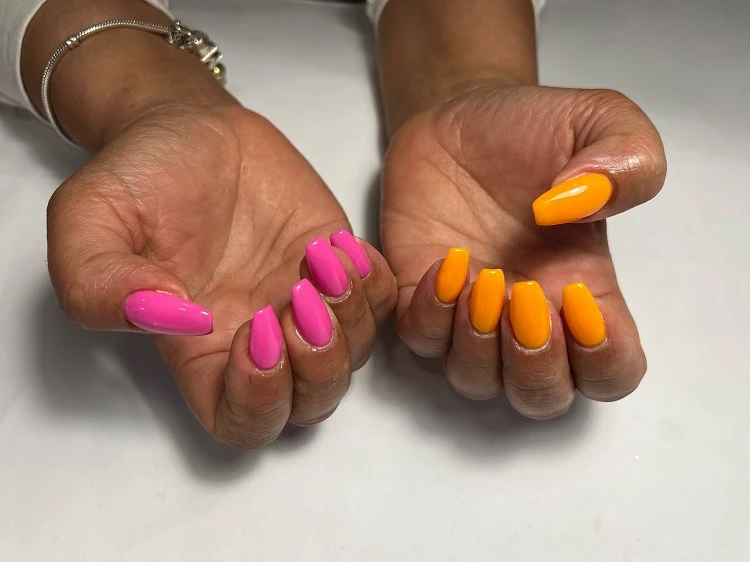 june nail colors 2023 hot pink and orange
