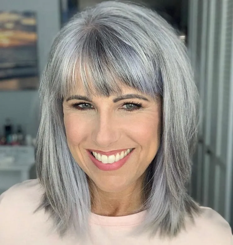 medium length hairstyles for over 50 with bangs shoulder length hairstyles for fine hair over 50