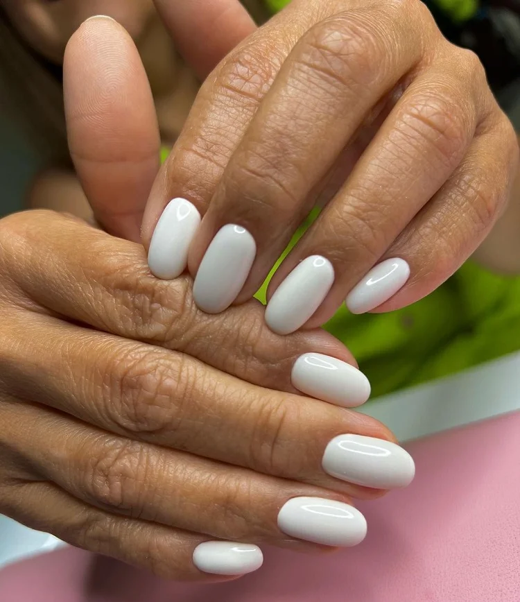 milky white nails for women over 50 almond shape