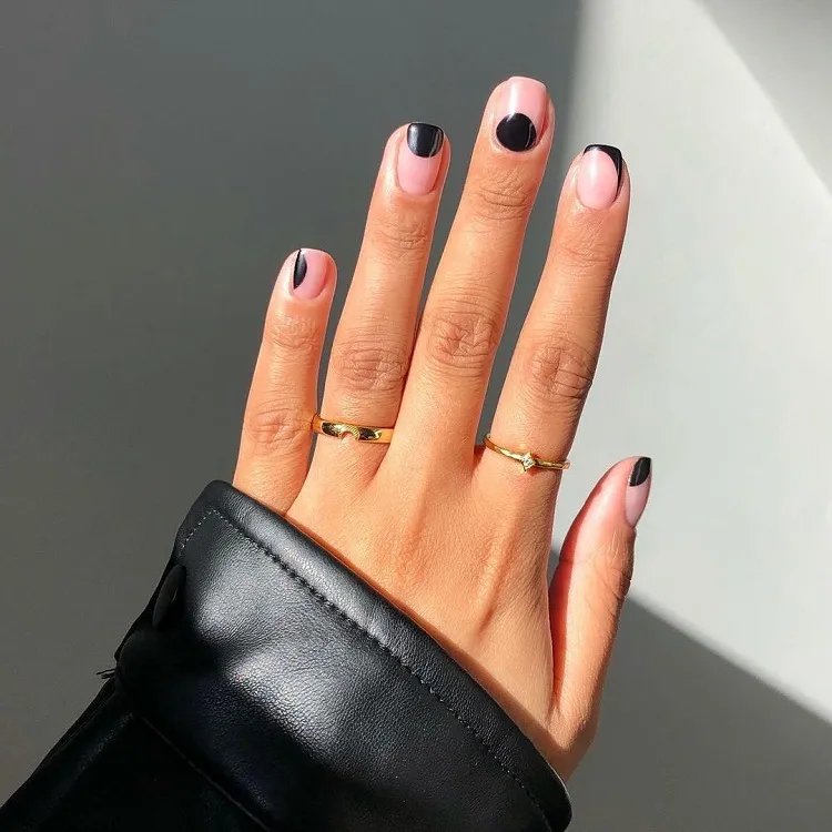 minimalist manicure negative space black spots abstract summer short nail design