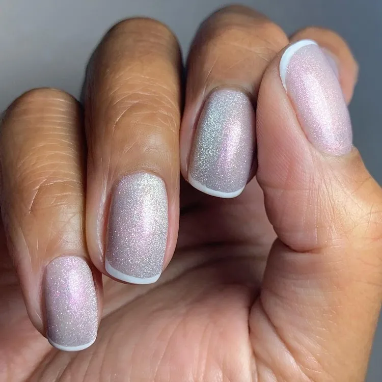 perfect sparkly short french tip manicure