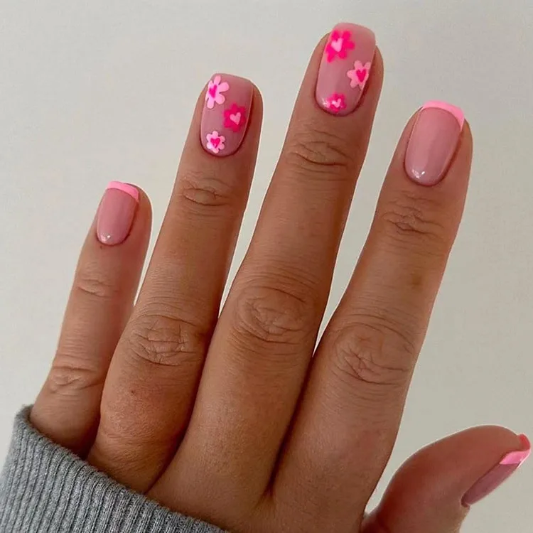 pink short french tip nail art with flowers