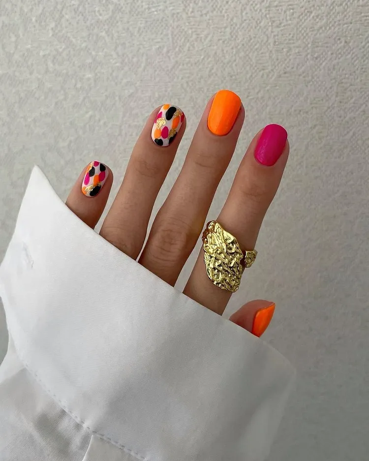short acrylic nails neon orange burgundy gold foil summer manicure ideas 2023