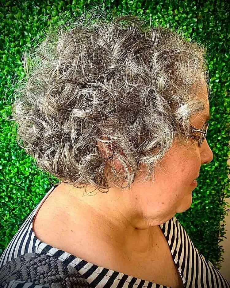 short and tousled curly bob for women over 60