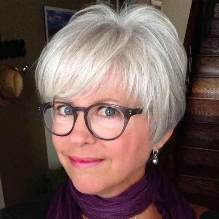 short bob haircut over 50 with glasses and bangs