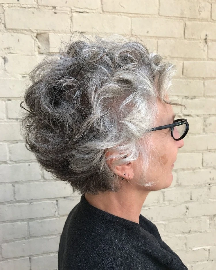 short curly hair pixie for women over 60 with glasses