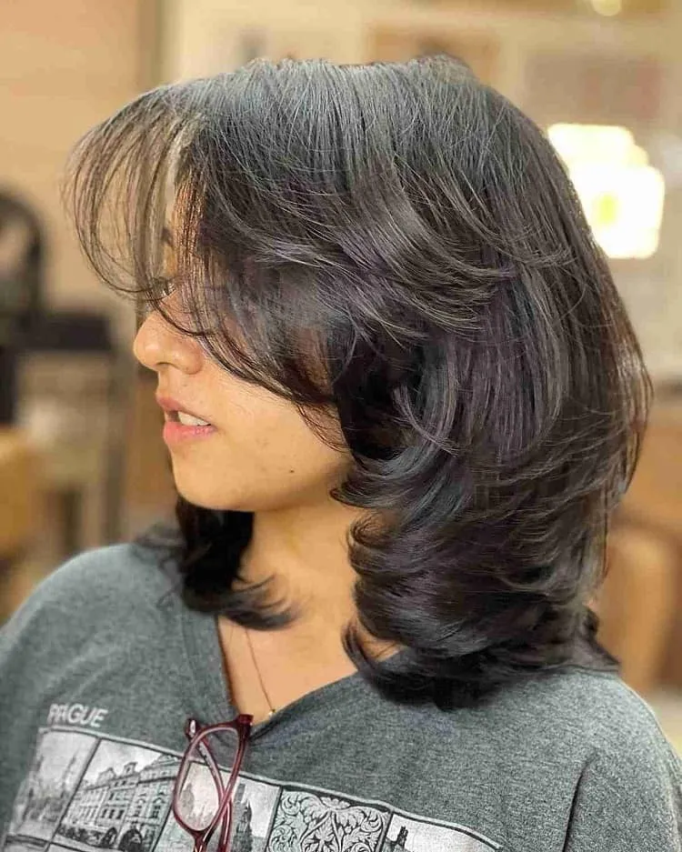short textured lob with layers and wispy bangs hairstyles