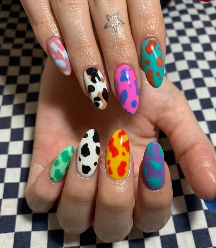 summer acrylic nails almond shape mismatched colorful cow print manicure design ideas