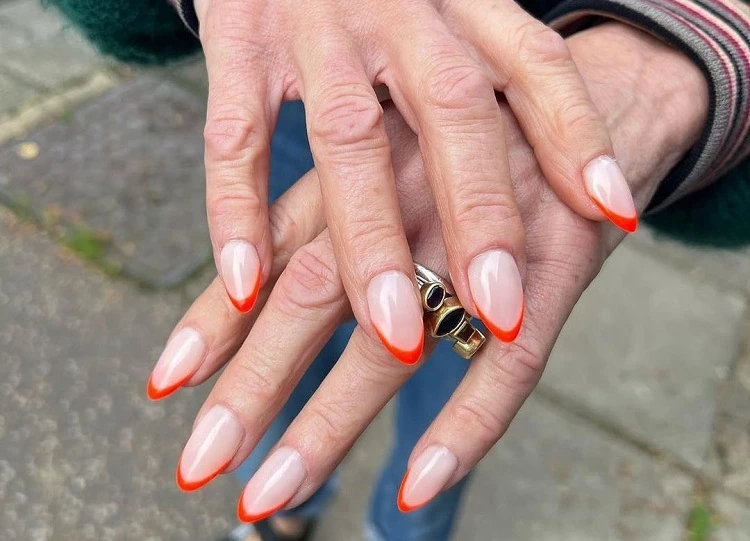 summer orange french tip nails for mature ladies over 50