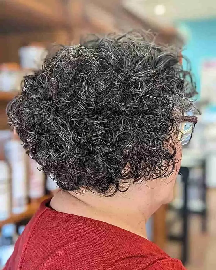 textured short bob cut with defined curls for older ladies aged 60