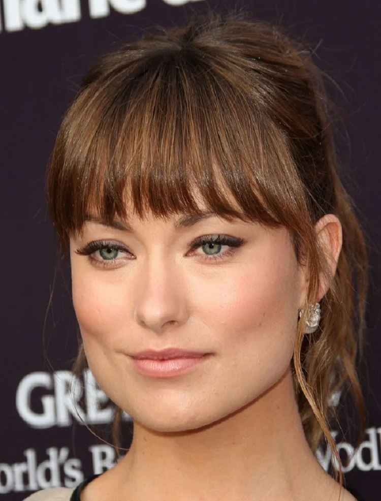 updo hairstyle for square shaped faces with blunt bangs 2023