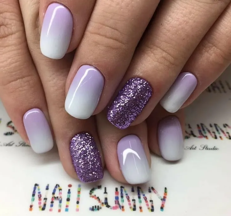white and purple ombre nails with glitter