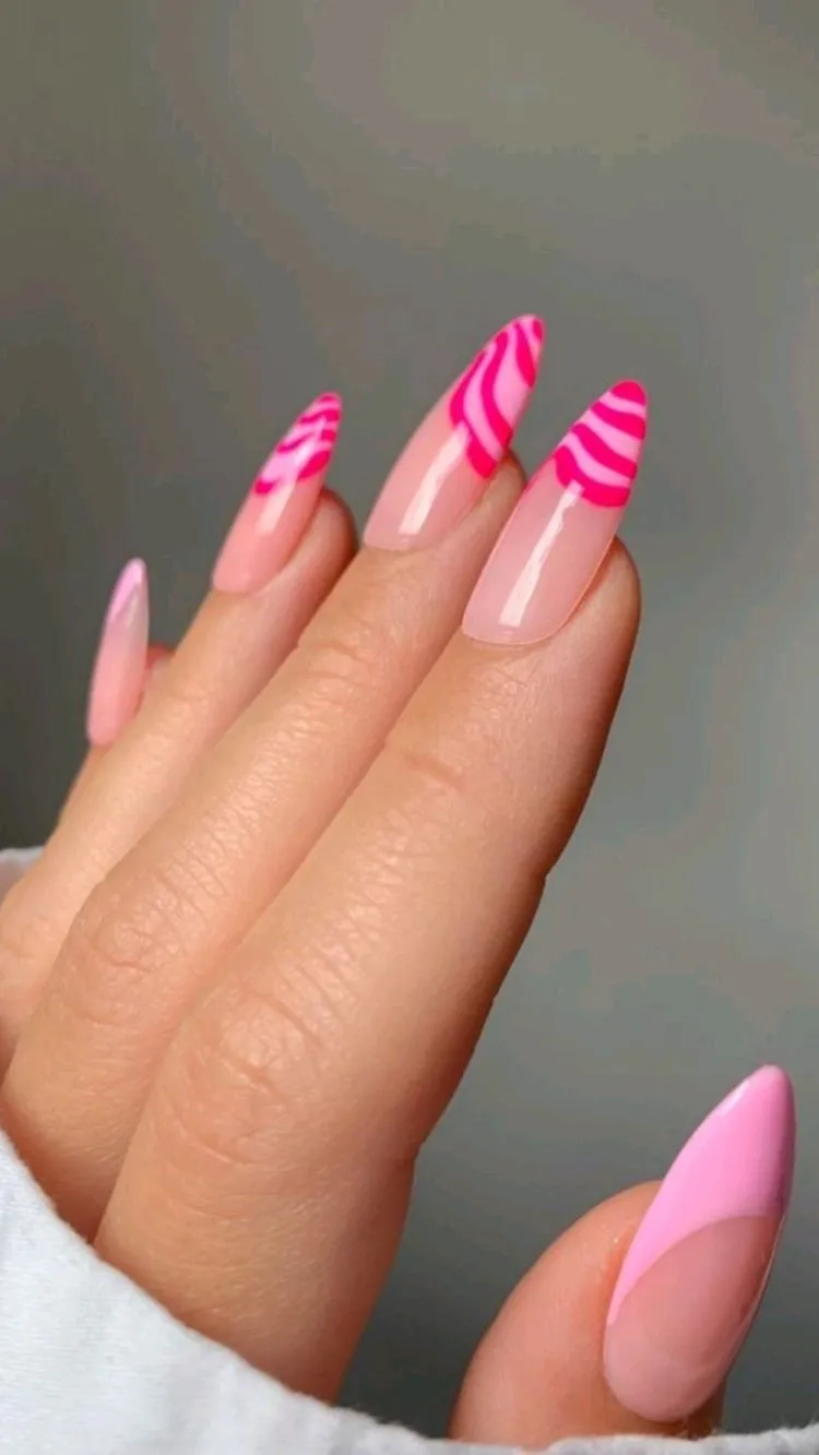 abstract pink waves french tips barbiecore manicure ideas 2023