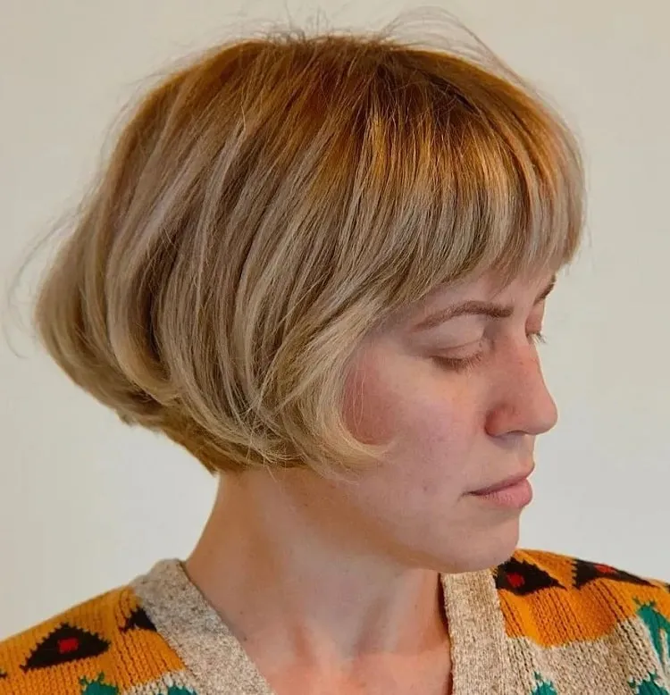 blonde micro bob with bangs for thick hair