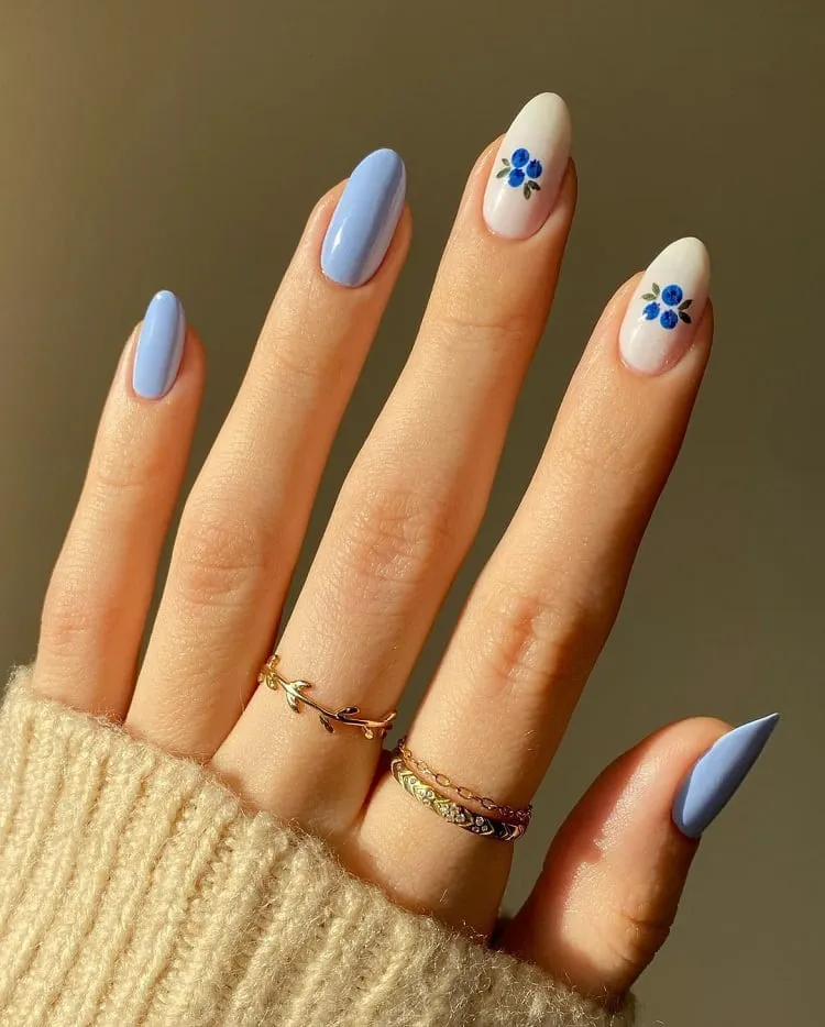 blueberry milk nail design with blueberries