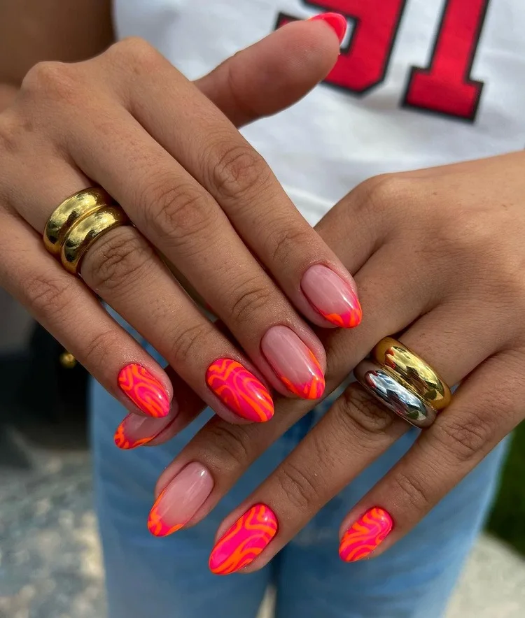 bright summer french tip nails in hot pink and orange