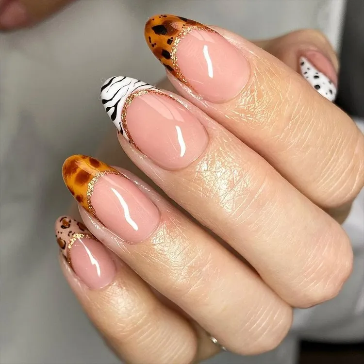 elegant animal print french tip nails gold glitter underline summer manicure 2023 ideas