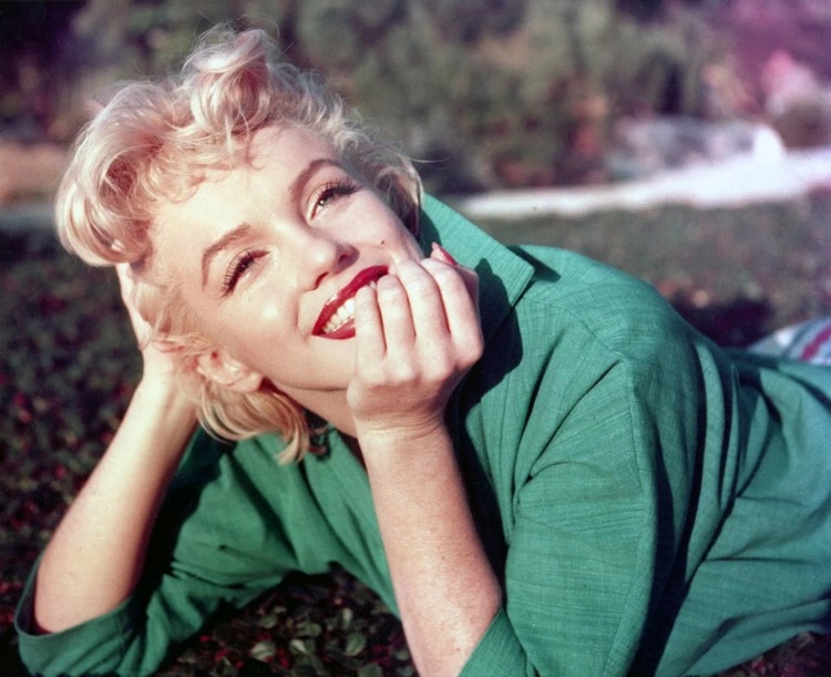 even marilyn monroe was wearing this bangs hairstyle at the time but with a side parting