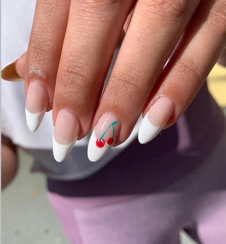 french tip nails with a cherry manicure 2023 summer almond shape