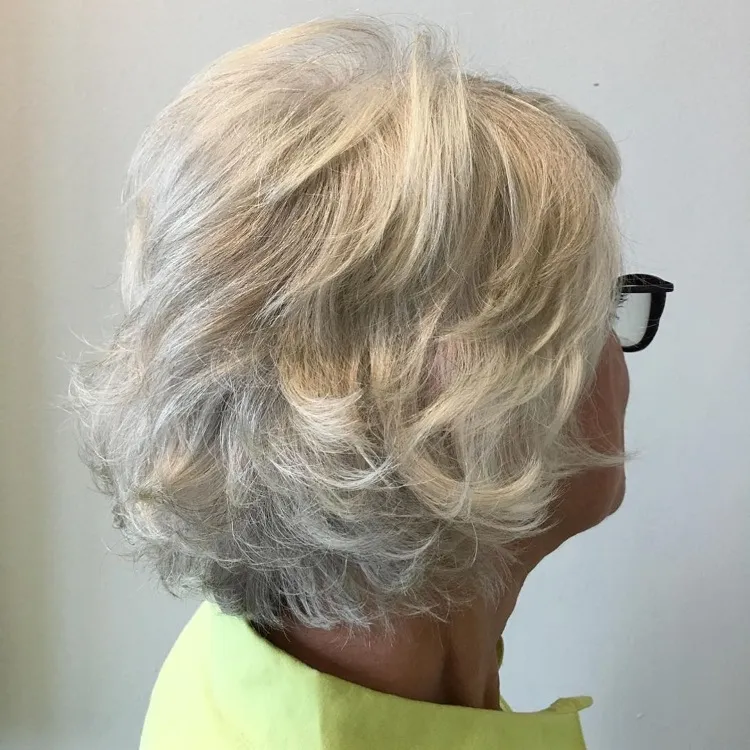 graduated bob haircut for white hair women over 60 layered hairstyle