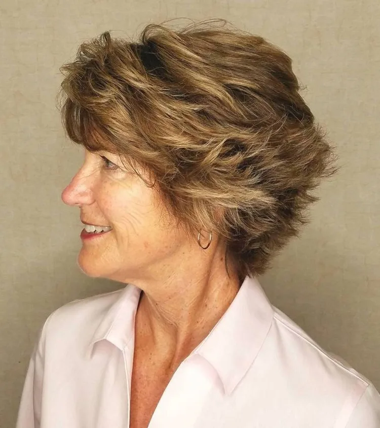 graduated bob haircut for women over 60 with piece y layers feathered