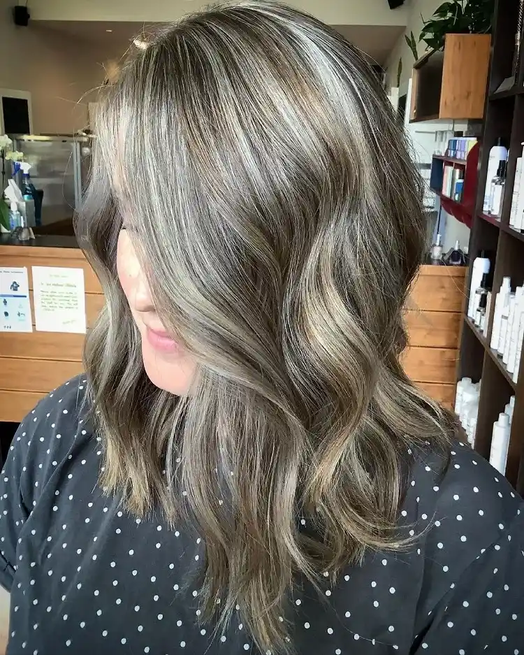 grey hair with blonde lowlights covering