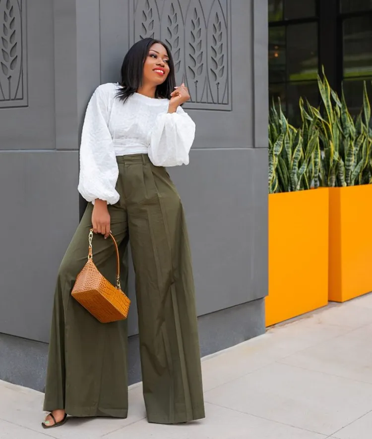 high waisted wide leg pants and white blouse with puff sleeves