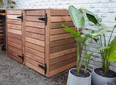 how to conceal trash bins in your garden