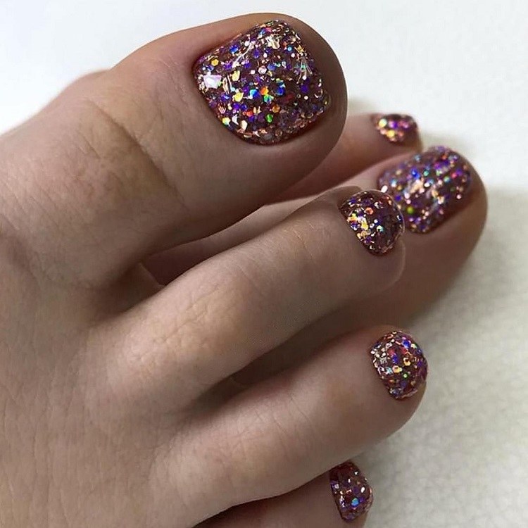 iridescent chunky glitter nail polsih outdated pedicure colors
