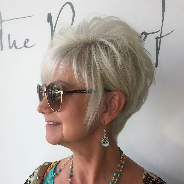 karen haircut with wispy bangs and layers for women over 60 white hair