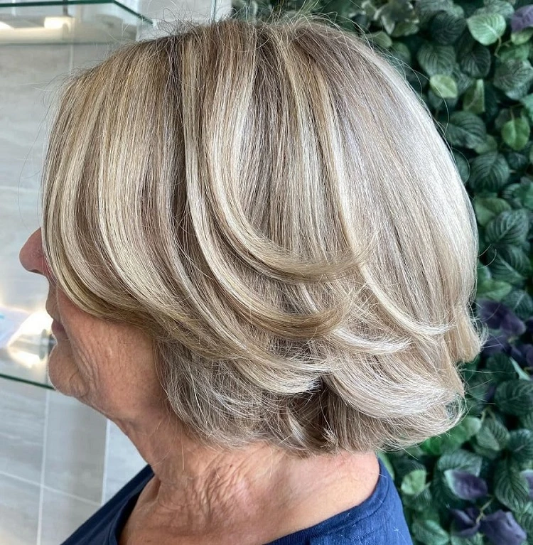 layered bob haircut over 60 with highlights for straight hair