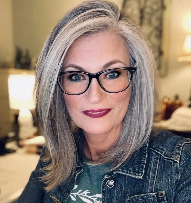 layered long bob for women over 50 with glasses layered bob haircuts for women over 50