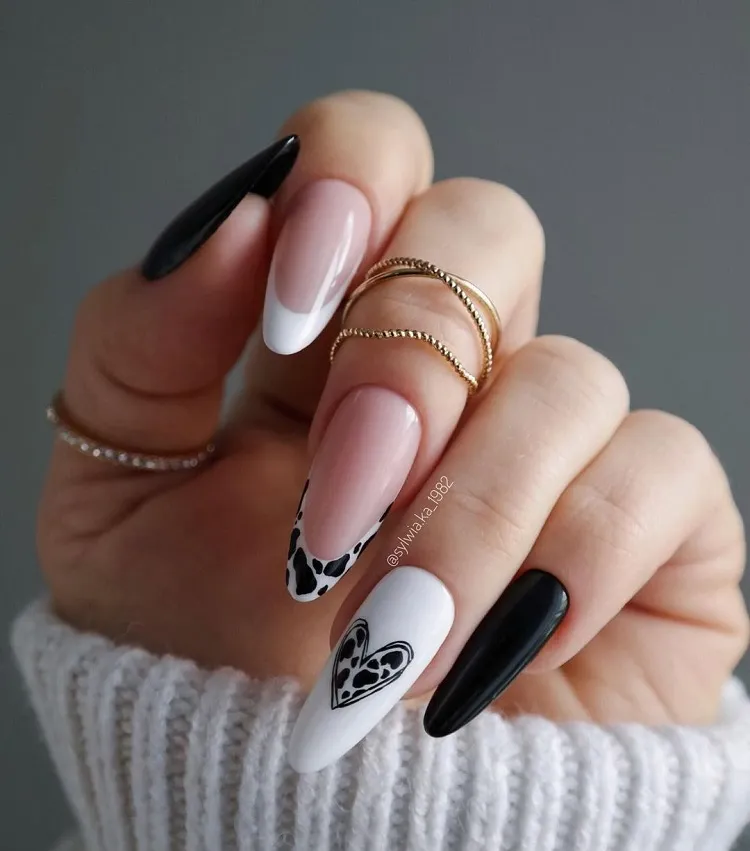 long oval nails black and white animal print french tips cow pattern heart decoration
