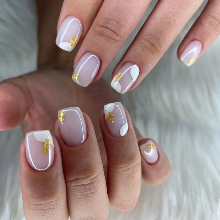 milk nails with gold flakes