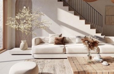 organic modern interior design open plan living room high ceilings natural light low furniture wood tactile fabrics