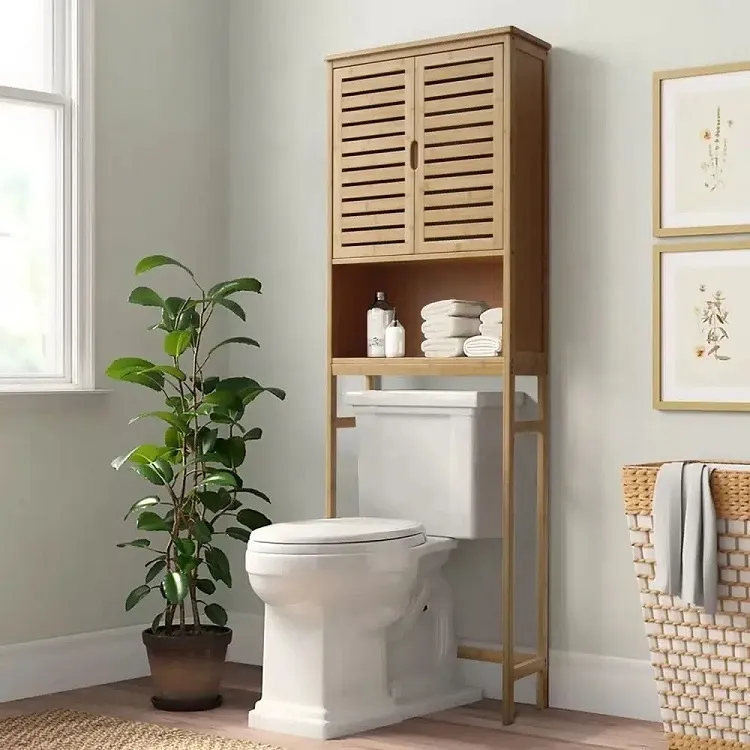 over the toilet storage cabinet small bathroom organization ideas on a budget