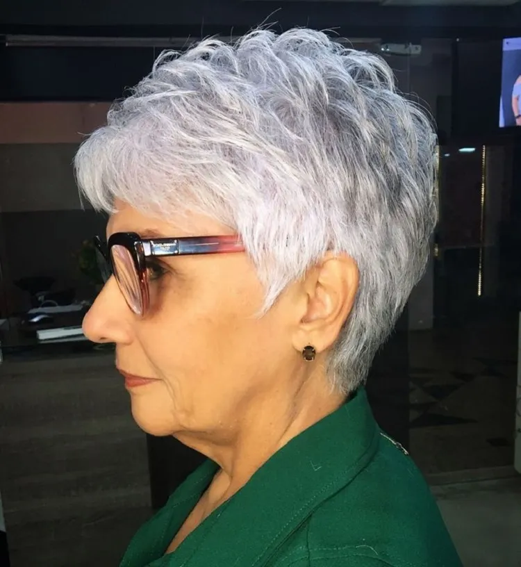 piecey pixie haircut with feathery layers for women over 60 with glasses