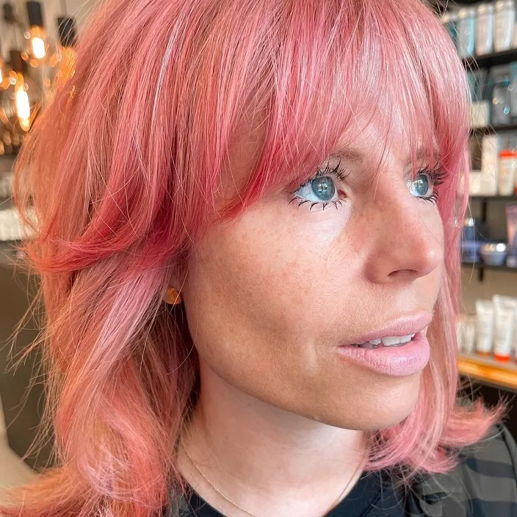pink short butterfly haircut women over 40 wispy bangs