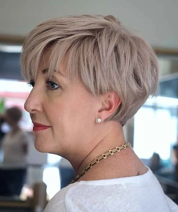 pixie bob with soft choppy layers for woman over 60 bixie haircut for women over 60
