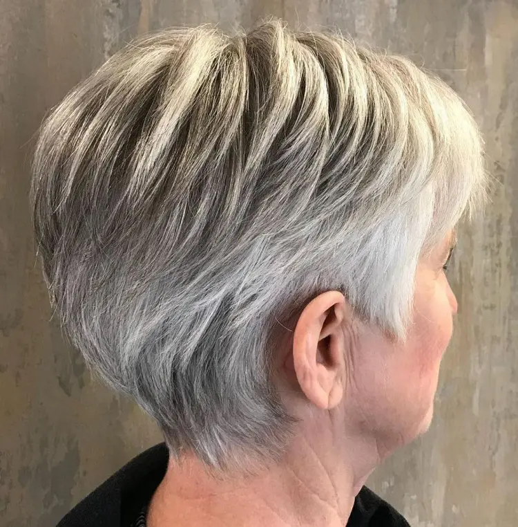 pixie haircut for women over 60 with feathered layers salt and pepper