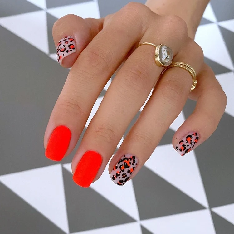 short animal print nails with hot red color
