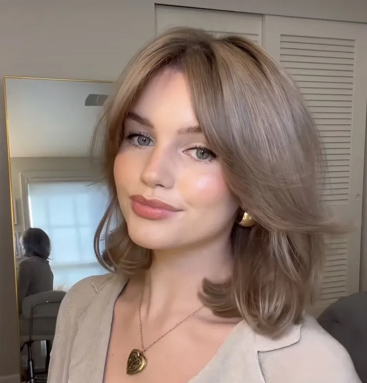 short butterfly haircut curtain bangs summer hair trend 2023